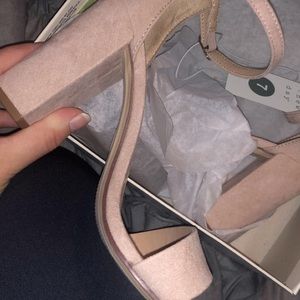 Pinkish badge heels
